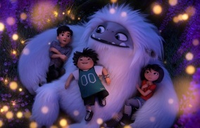 (from left) – Jin (Tenzing Norgay Trainor), Peng (Albert Tsai) and Yi (Chloe Bennet) with the Yeti, Everest, in DreamWorks Animation and Pearl Studio’s Abominable, written and directed by Jill Culton.